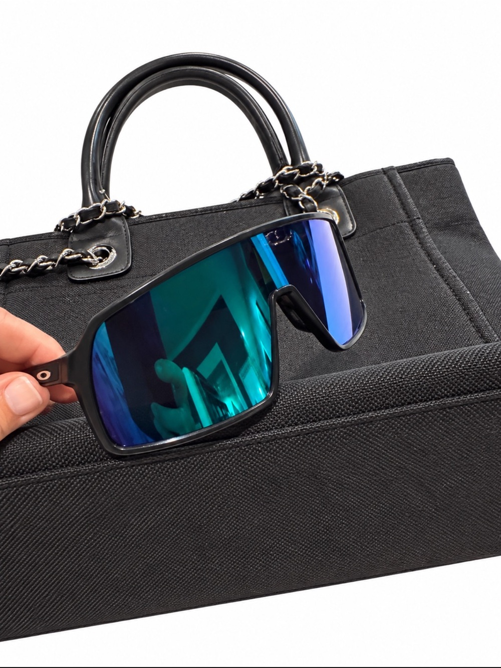 Sutro Oakley Black Frame Sunglasses with Blue-Green Mirrored Lenses and case.